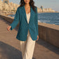 Model wearing Seamless SeamSoft™ Summer Oversize Blazer in green on Alexandria corniche at golden hour