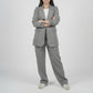 Person wearing a gray suit on a white background