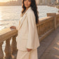 Seamless SeamSoft™ Summer Oversize Blazer in beige — true cream ivory tone, styled on Alexandria corniche at golden hour — premium Egyptian comfortwear