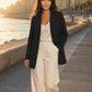 Seamless SeamSoft™ Summer Oversize Blazer in black — styled on Alexandria corniche at golden hour