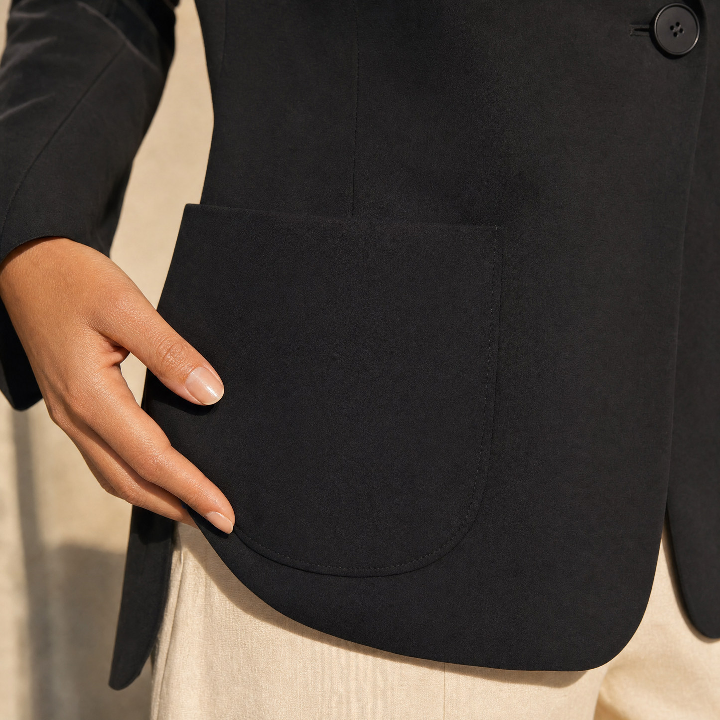Seamless Slim Blazer — rounded patch pocket detail